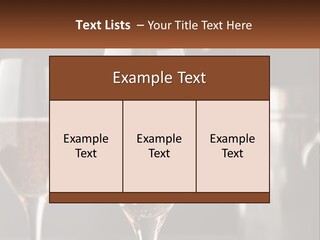 A Couple Of Wine Glasses Sitting On Top Of A Table PowerPoint Template