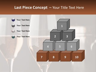 A Couple Of Wine Glasses Sitting On Top Of A Table PowerPoint Template