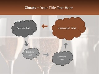 A Couple Of Wine Glasses Sitting On Top Of A Table PowerPoint Template