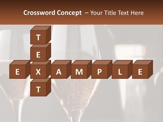 A Couple Of Wine Glasses Sitting On Top Of A Table PowerPoint Template