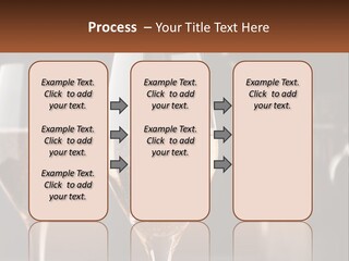 A Couple Of Wine Glasses Sitting On Top Of A Table PowerPoint Template
