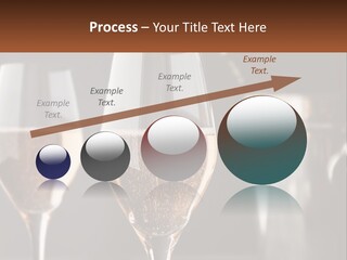 A Couple Of Wine Glasses Sitting On Top Of A Table PowerPoint Template