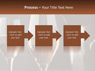 A Couple Of Wine Glasses Sitting On Top Of A Table PowerPoint Template