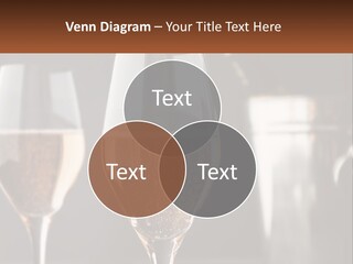 A Couple Of Wine Glasses Sitting On Top Of A Table PowerPoint Template