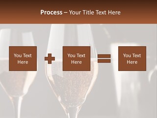 A Couple Of Wine Glasses Sitting On Top Of A Table PowerPoint Template