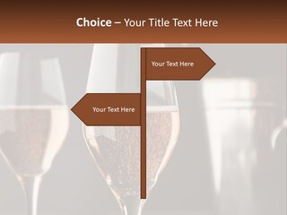 A Couple Of Wine Glasses Sitting On Top Of A Table PowerPoint Template