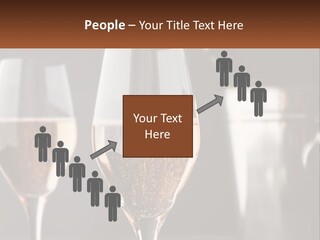 A Couple Of Wine Glasses Sitting On Top Of A Table PowerPoint Template