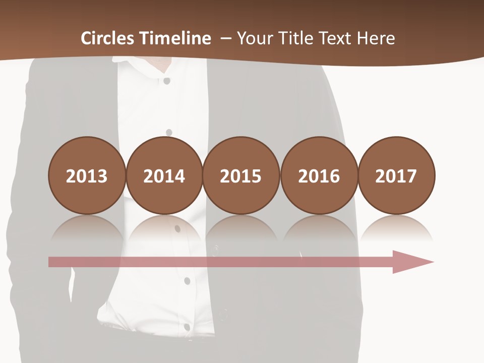 A Man In A Suit Standing In Front Of A Brown Background PowerPoint Template