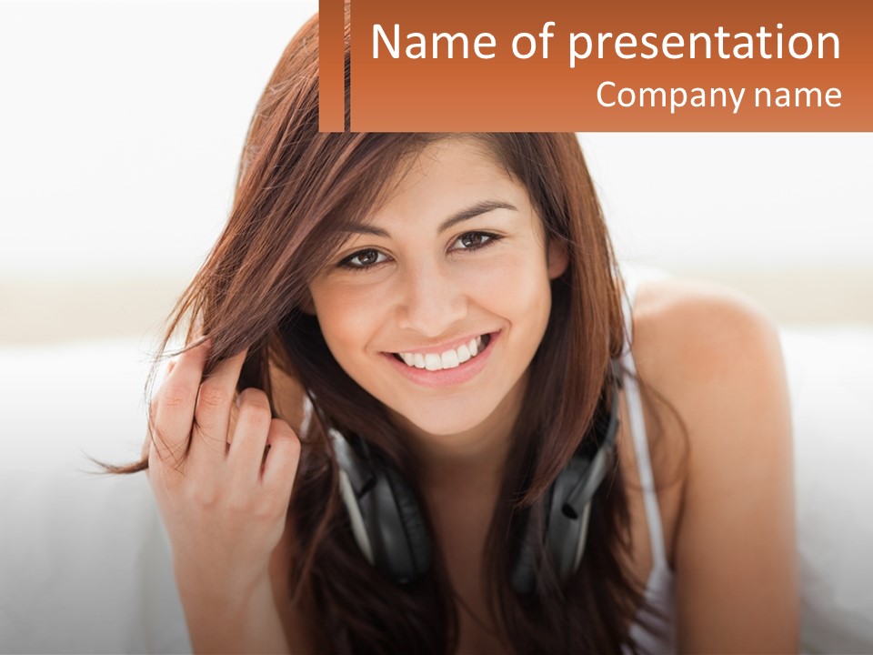 A Woman With Headphones Is Smiling For The Camera PowerPoint Template