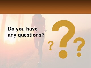 A Woman Running Down A Road With The Sun Setting In The Background PowerPoint Template