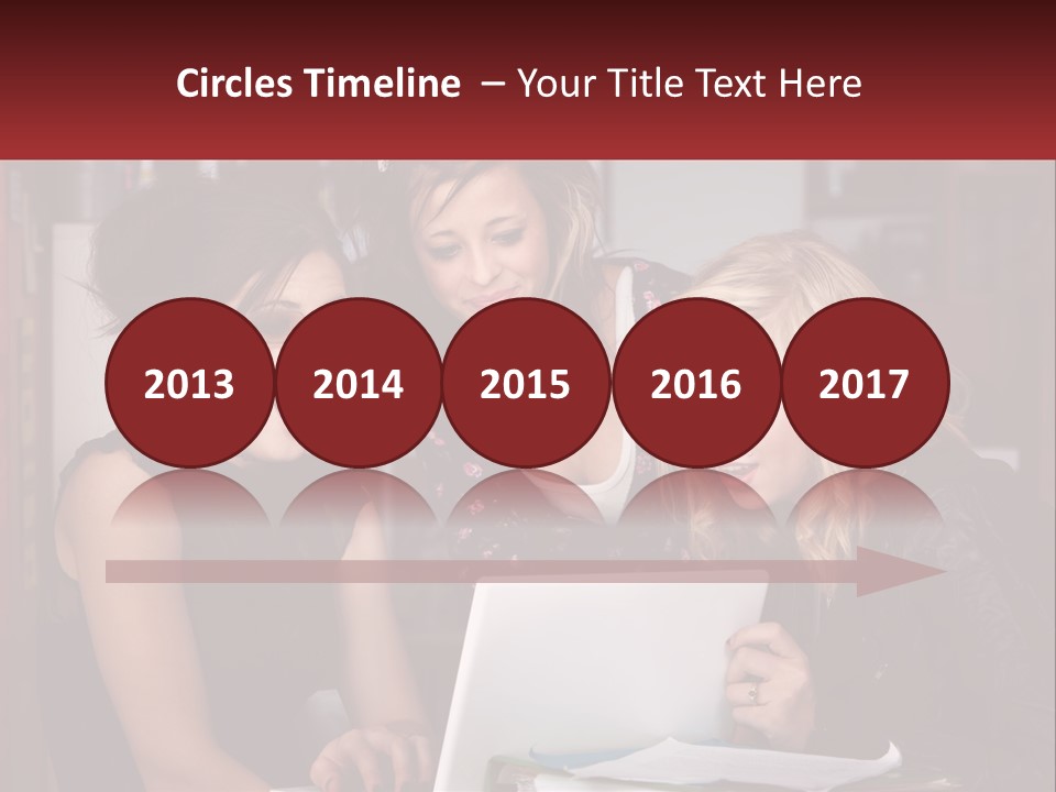 Three Young Women Looking At A Laptop Screen PowerPoint Template