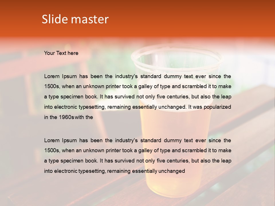 A Glass Of Beer Sitting On Top Of A Wooden Table PowerPoint Template