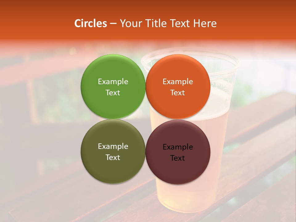 A Glass Of Beer Sitting On Top Of A Wooden Table PowerPoint Template