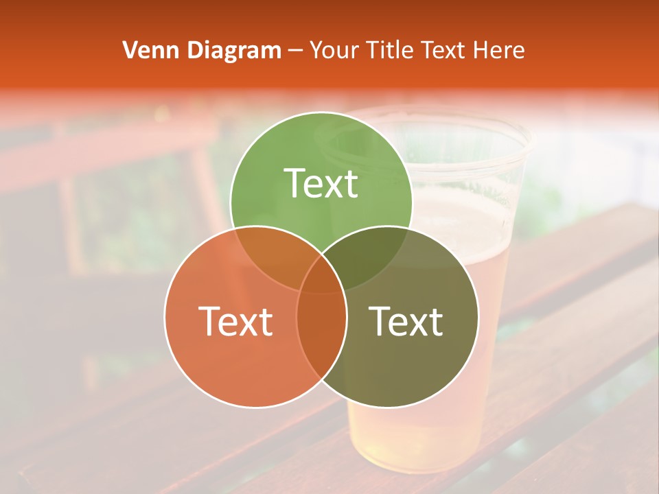 A Glass Of Beer Sitting On Top Of A Wooden Table PowerPoint Template