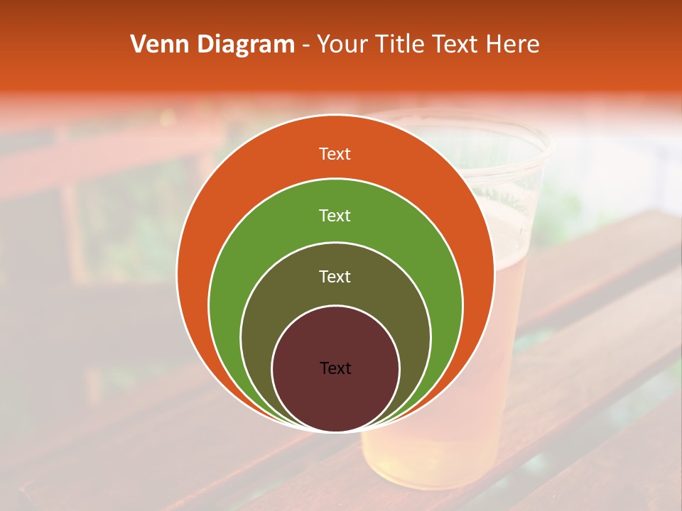 A Glass Of Beer Sitting On Top Of A Wooden Table PowerPoint Template