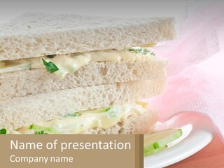 A White Plate Topped With A Sandwich On Top Of A Table PowerPoint Template