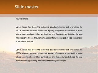 A Bench Sitting On Top Of A Sandy Beach PowerPoint Template