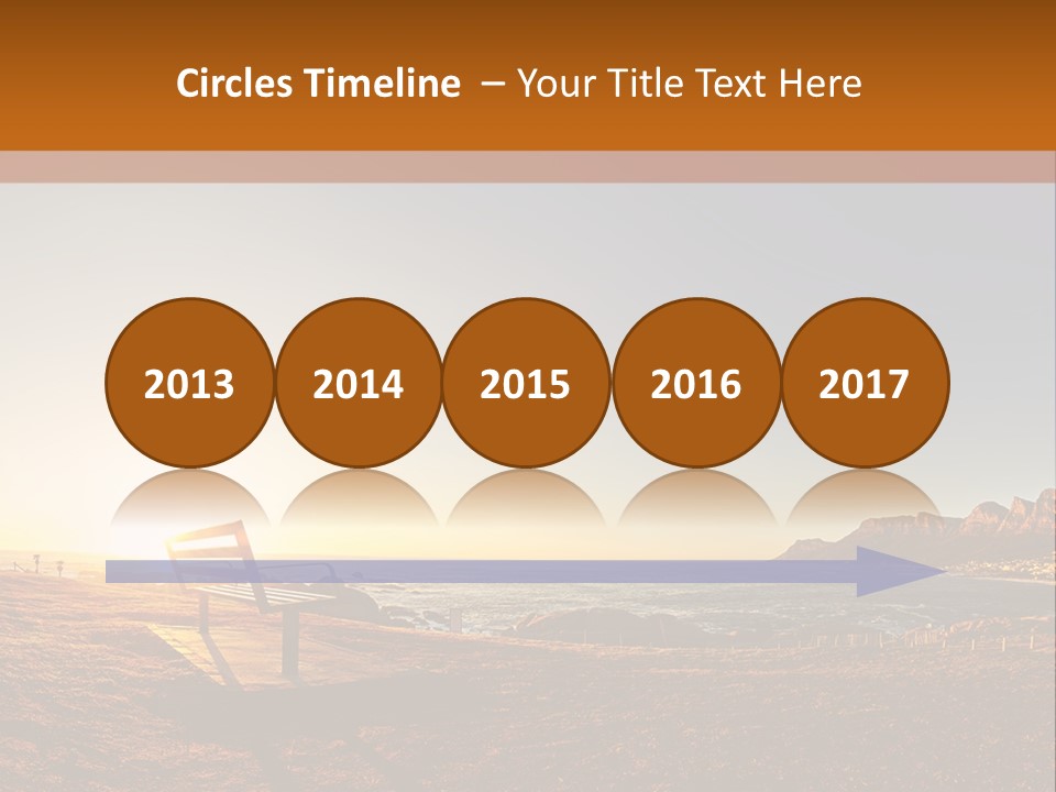 A Bench Sitting On Top Of A Sandy Beach PowerPoint Template