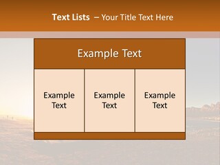 A Bench Sitting On Top Of A Sandy Beach PowerPoint Template