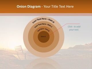 A Bench Sitting On Top Of A Sandy Beach PowerPoint Template
