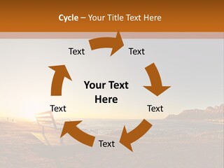 A Bench Sitting On Top Of A Sandy Beach PowerPoint Template