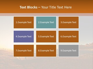 A Bench Sitting On Top Of A Sandy Beach PowerPoint Template