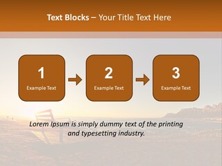 A Bench Sitting On Top Of A Sandy Beach PowerPoint Template