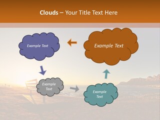 A Bench Sitting On Top Of A Sandy Beach PowerPoint Template