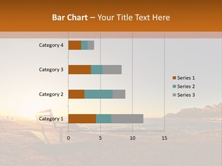 A Bench Sitting On Top Of A Sandy Beach PowerPoint Template