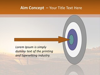 A Bench Sitting On Top Of A Sandy Beach PowerPoint Template