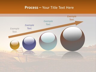 A Bench Sitting On Top Of A Sandy Beach PowerPoint Template