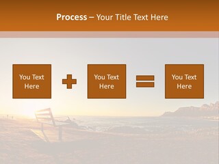 A Bench Sitting On Top Of A Sandy Beach PowerPoint Template