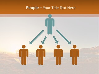 A Bench Sitting On Top Of A Sandy Beach PowerPoint Template