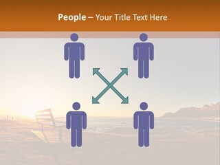 A Bench Sitting On Top Of A Sandy Beach PowerPoint Template