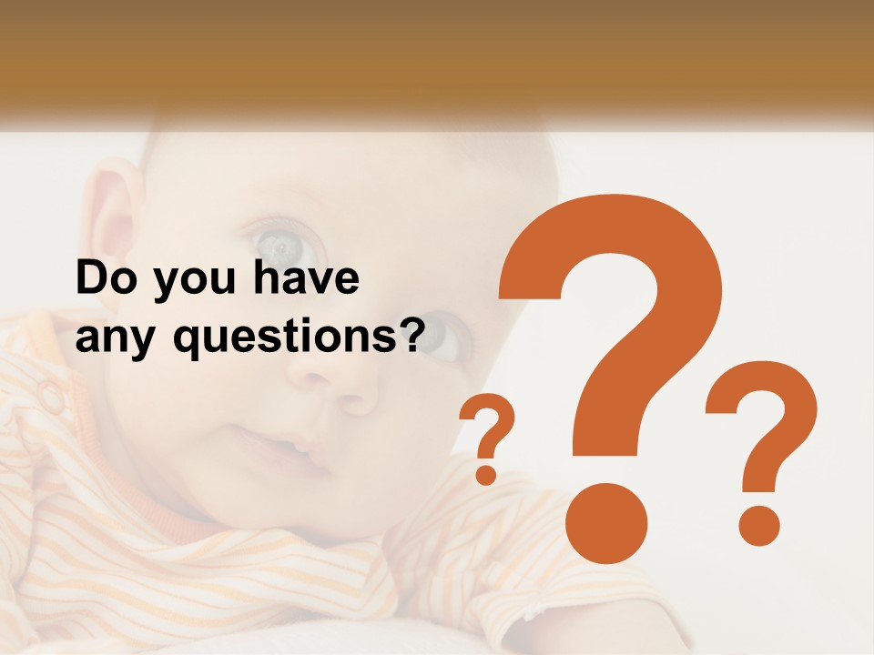A Baby With Blue Eyes Is Looking At The Camera PowerPoint Template