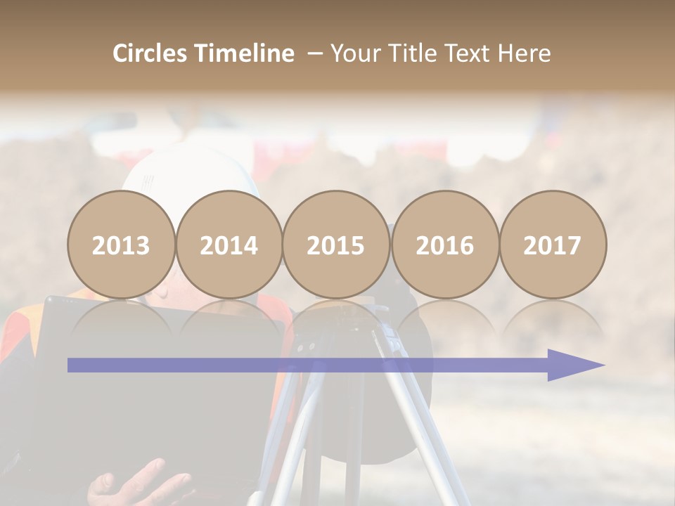 A Man In A Hard Hat Is Looking At Something On A Tripod PowerPoint Template