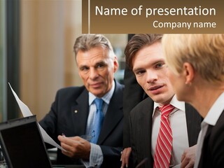 A Group Of People Sitting Around A Table Talking PowerPoint Template