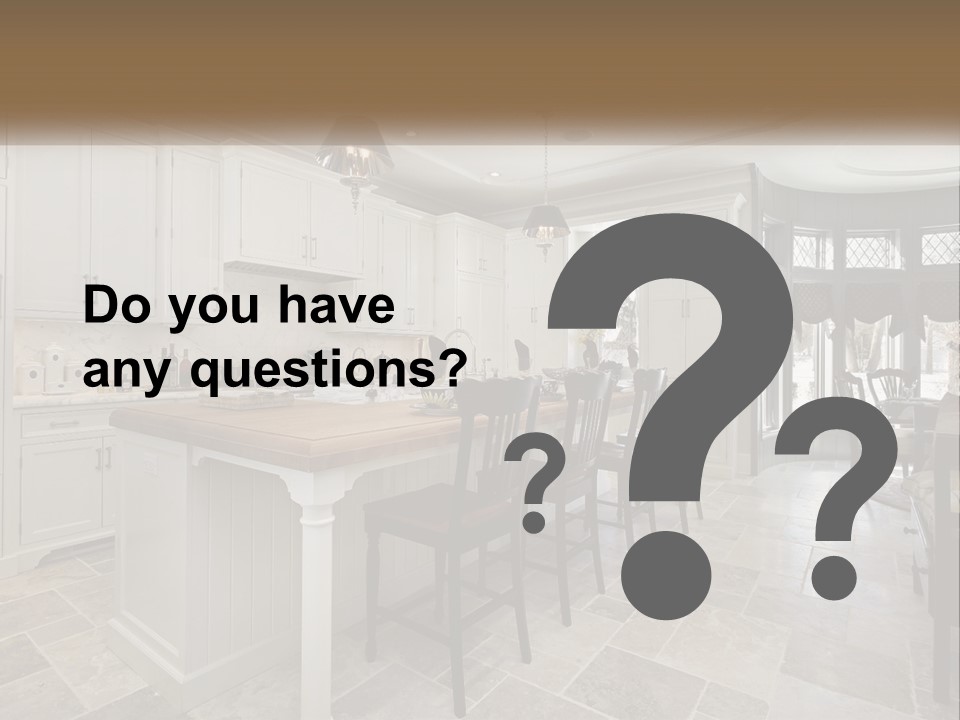 A Large Kitchen With A Table And Chairs PowerPoint Template