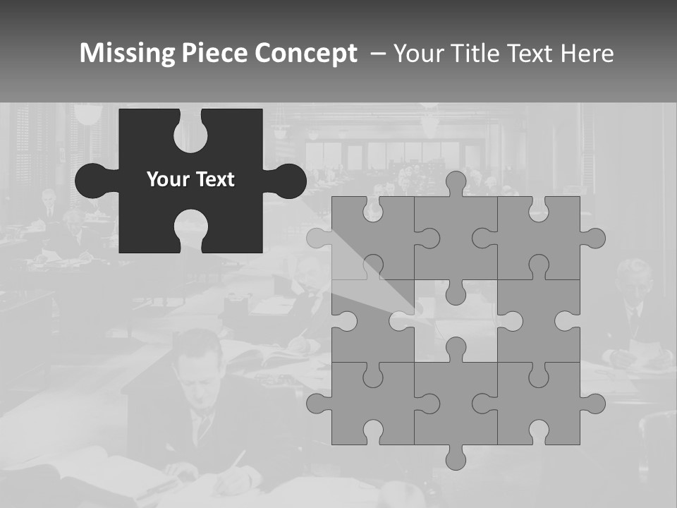 A Group Of People Sitting At Desks In A Room PowerPoint Template