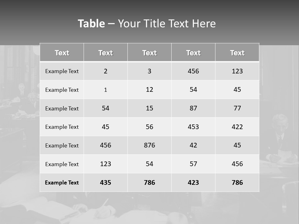A Group Of People Sitting At Desks In A Room PowerPoint Template