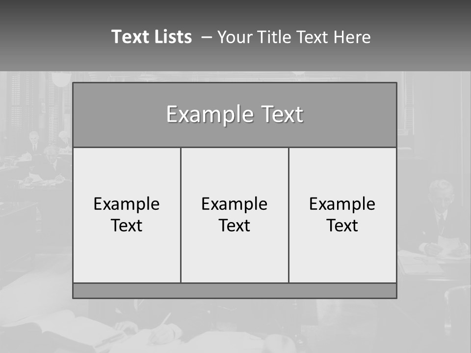 A Group Of People Sitting At Desks In A Room PowerPoint Template