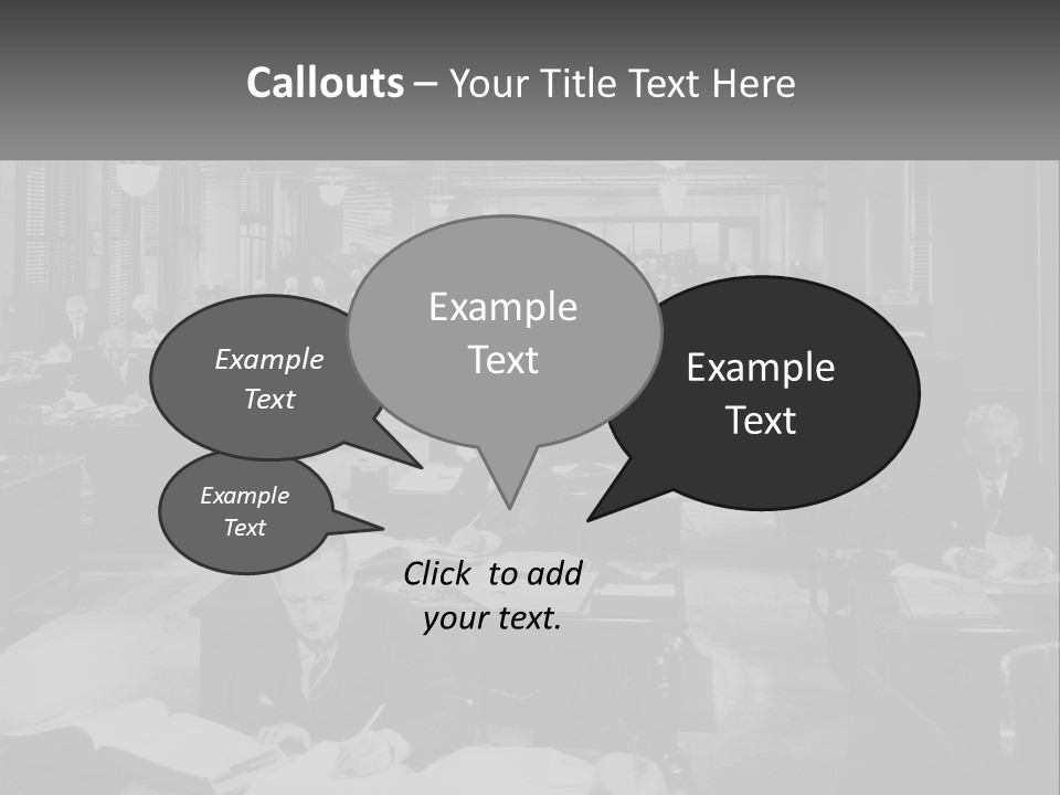 A Group Of People Sitting At Desks In A Room PowerPoint Template