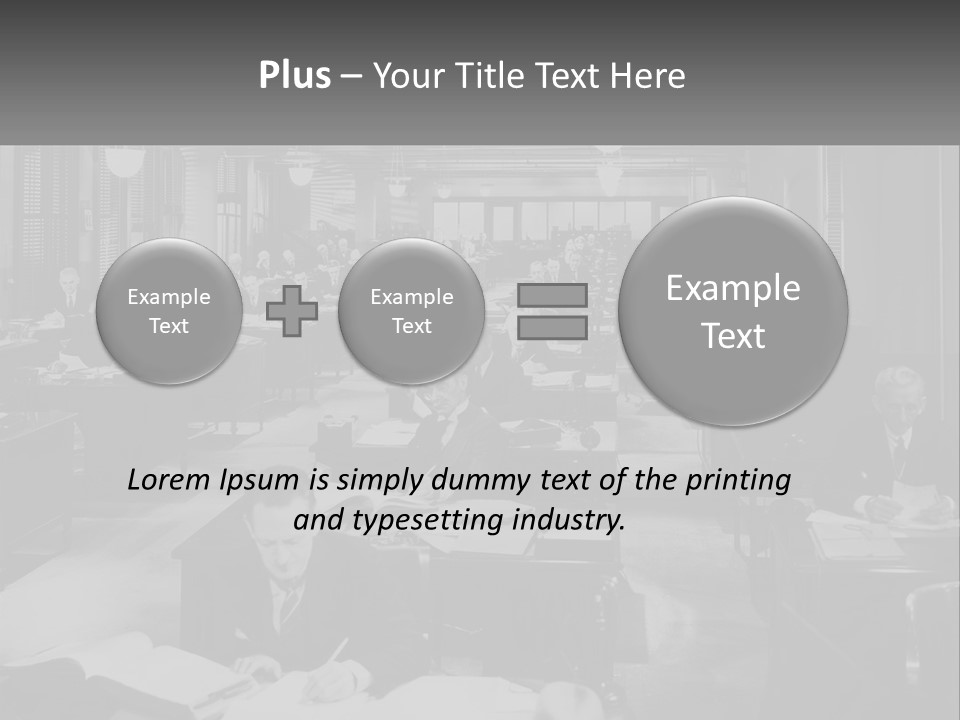A Group Of People Sitting At Desks In A Room PowerPoint Template