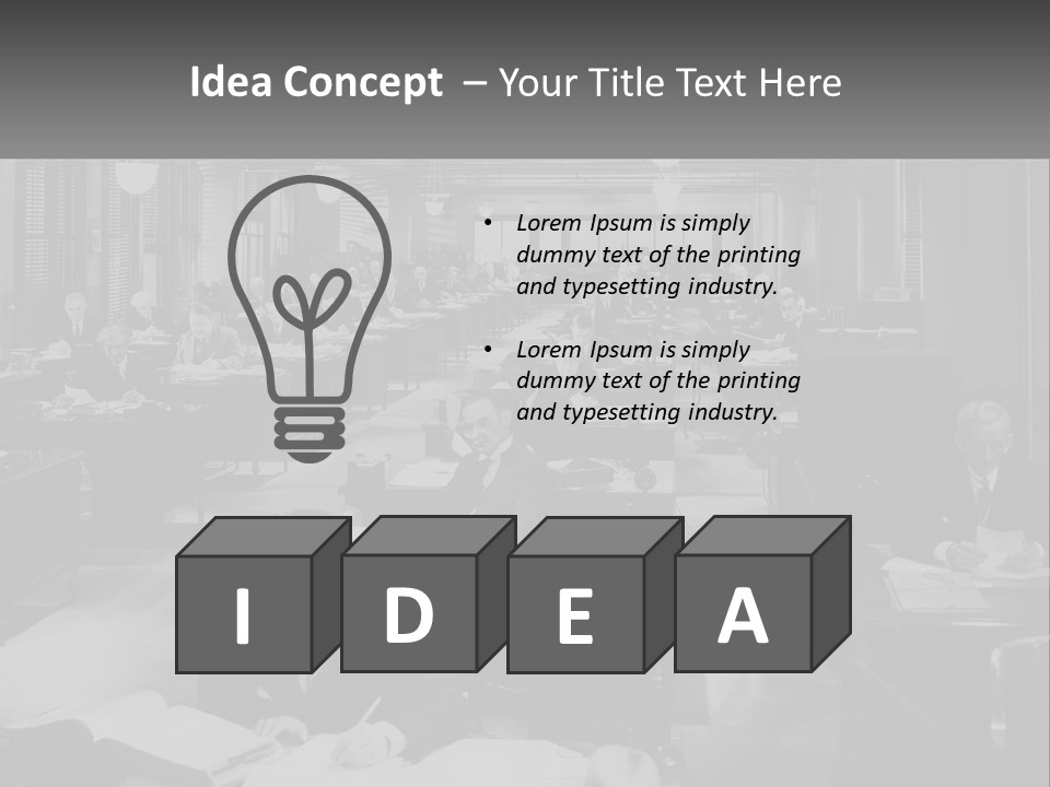 A Group Of People Sitting At Desks In A Room PowerPoint Template