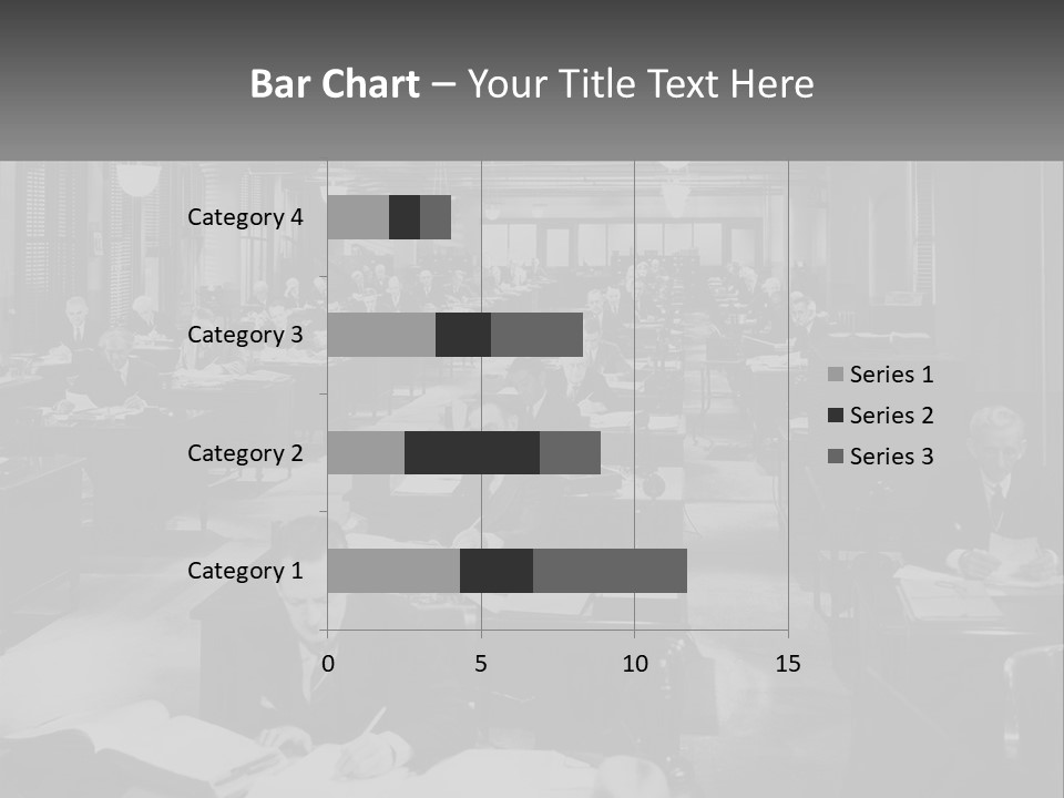 A Group Of People Sitting At Desks In A Room PowerPoint Template