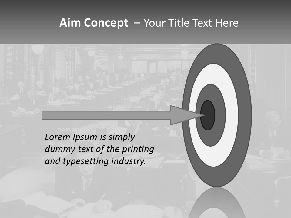 A Group Of People Sitting At Desks In A Room PowerPoint Template