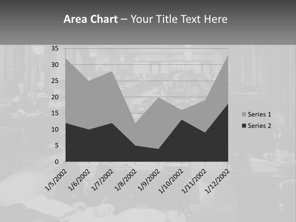 A Group Of People Sitting At Desks In A Room PowerPoint Template