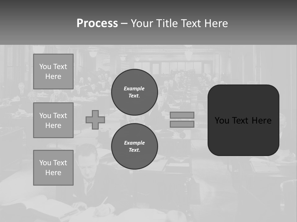 A Group Of People Sitting At Desks In A Room PowerPoint Template