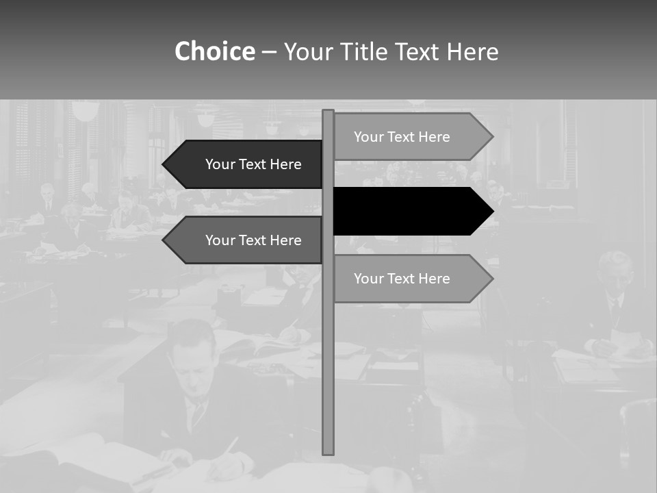 A Group Of People Sitting At Desks In A Room PowerPoint Template
