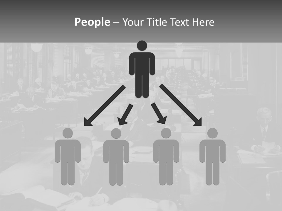 A Group Of People Sitting At Desks In A Room PowerPoint Template